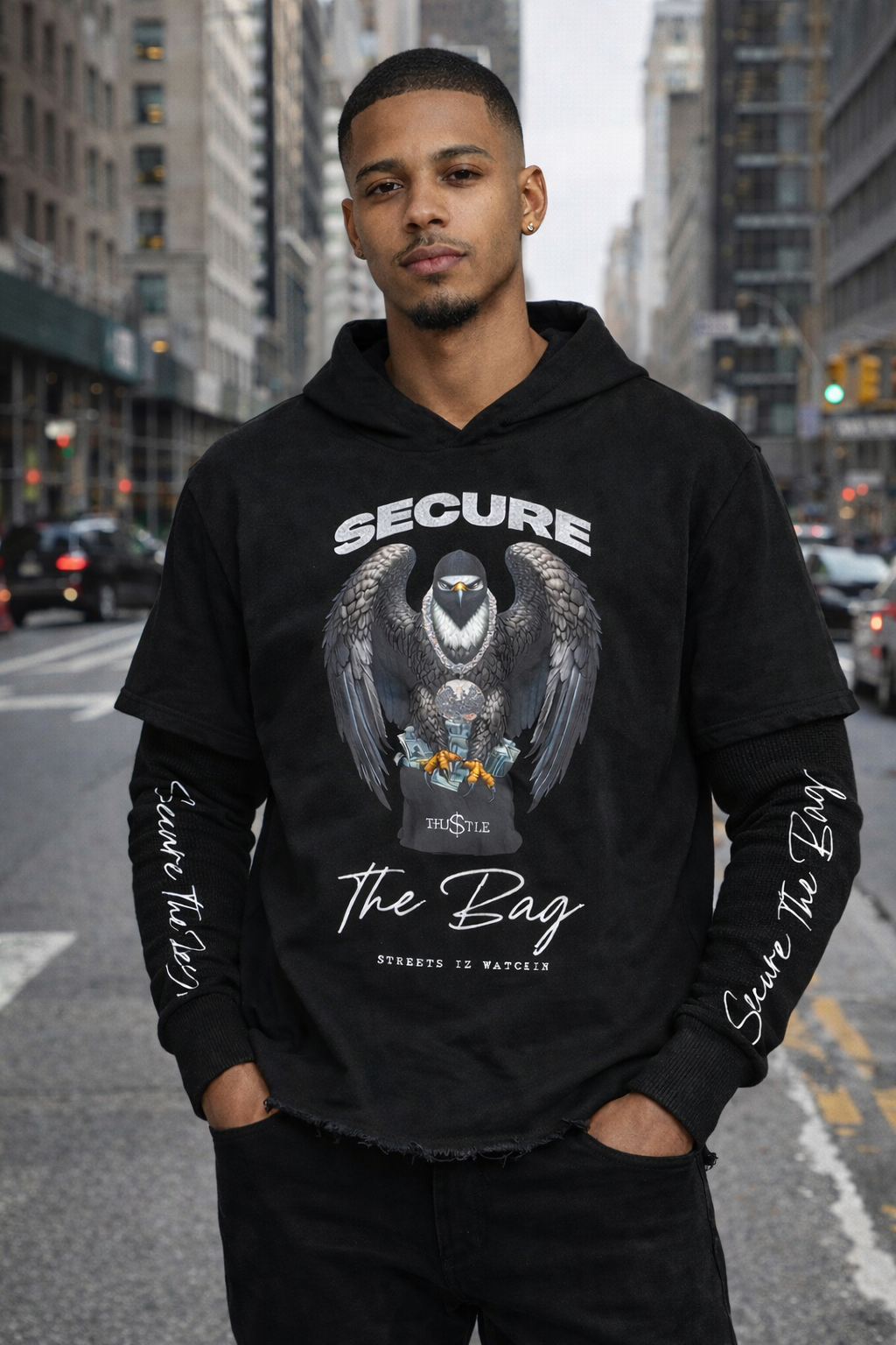 Streetz Iz Watchin Secure The Bag Thermal Sleeve Hoodie — black graphic hoodie with thermal sleeves on model