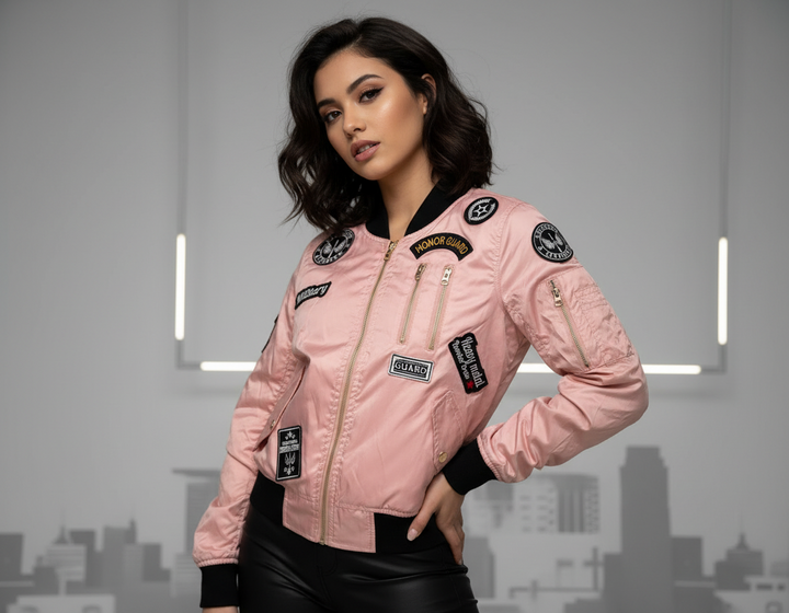 Red Fox women’s pink zip-front jacket with decorative patches and black collar, cuffs and hem